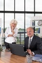 Business couple in office Royalty Free Stock Photo