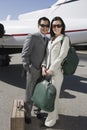 Business Couple Standing Together At Airfield Royalty Free Stock Photo
