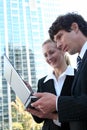 Business couple using laptop Royalty Free Stock Photo