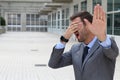 Business covering his eyes to avoid reality Royalty Free Stock Photo