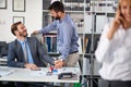 Business coworkers working together on business project in modern office