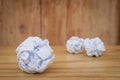 Business Creative and Idea Concept : Close up many white crumpled paper ball put on wooden foor. Royalty Free Stock Photo