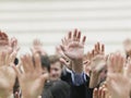 Business Crowd Raising Hands Royalty Free Stock Photo
