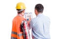 Business developer and contractor builder discussing charts Royalty Free Stock Photo