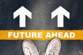 Future ahead words and white arrow with yellow line on asphalt road Royalty Free Stock Photo