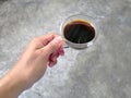 Male hand holding cup of coffee. Royalty Free Stock Photo