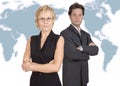 Business duet next to world map Royalty Free Stock Photo
