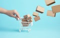 Business ecommerce or online shopping concepts with person and product box order and trolley Royalty Free Stock Photo