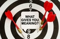 There is a sign on the target that says - WHAT GIVES YOU MEANING