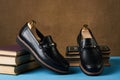 Business education concept with mens black leather shoes, close-up. Royalty Free Stock Photo