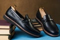Business education concept with mens black leather shoes, close-up. Royalty Free Stock Photo