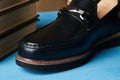 Business education concept with mens black leather shoes, close-up. Royalty Free Stock Photo