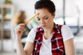 Creative woman with pencil thinking at office Royalty Free Stock Photo