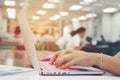 Business, education, people and technology concept - close up of female hands typing on keyboard of laptop computer with Blurred Royalty Free Stock Photo