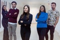 Business, education and sucess concept, Group of Young business people standing and looking at camera