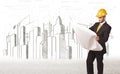 Business Engineer man with building city drawing in background Royalty Free Stock Photo