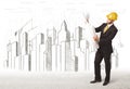 Business Engineer man with building city drawing in background Royalty Free Stock Photo