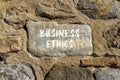 Business ethics symbol. Concept words Business ethics on beautiful grey stone. Beautiful brown stone wall background. Business Royalty Free Stock Photo