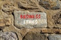 Business ethics symbol. Concept words Business ethics on beautiful grey stone. Beautiful brown stone wall background. Business Royalty Free Stock Photo