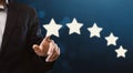 Unrecognizable businessman pointing at five star symbol, increasing rating of company