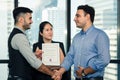 Executive management having congratulation to executive staff who get award with certificate of excellence Royalty Free Stock Photo