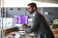 Business executive searching for someone from the stair top Royalty Free Stock Photo