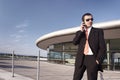 Business executive talking on cell phone. Royalty Free Stock Photo