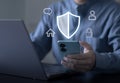 Business experts present an image of a security shield, symbolizing cybersecurity, data protection, privacy, secure access, and Royalty Free Stock Photo