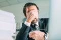 Business failure, disappointed businessman entrepreneur covering cafe with hand in disbelief