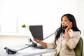 Business female speaking on phone