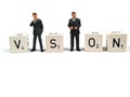 Business figurines forming the word vision Royalty Free Stock Photo