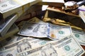 Business & Finance Affluence Concept With Stacks Of Cash With Gold Bar & Luxury Watch