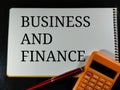 BUSINESS AND FINANCE in black word.