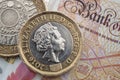 Business and finance, British economy and currency exchange concept with macro close up on one pound and two pounds coins and 10 Royalty Free Stock Photo