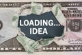 The dollar is torn in the center. In the center it is written - LOADING... IDEA Royalty Free Stock Photo