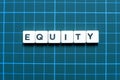 Business and finance concept.Equity letter on green background.