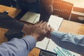 Businessman teamwork shaking hand in conference room