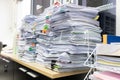 Business and finance concept of office working, Pile of unfinished documents on office desk, Stack of business paper Royalty Free Stock Photo