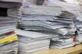 Business and finance concept of office working, Pile of unfinished documents on office desk, Stack of business paper