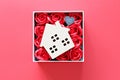 Wood house model with love you tag and red roses on red background with copy space for adding or mock up Royalty Free Stock Photo