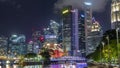 Business Financial Downtown City and Skyscrapers Tower Building at Marina Bay night timelapse hyperlapse, Singapore Royalty Free Stock Photo