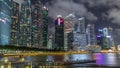 Business Financial Downtown City and Skyscrapers Tower Building at Marina Bay night timelapse hyperlapse, Singapore Royalty Free Stock Photo