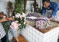 Business of flower shop with man owner