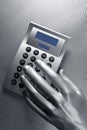 Business futuristic silver hand calculator