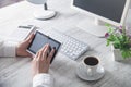 Business girl using tablet computer in office desk Royalty Free Stock Photo