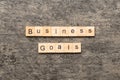business GOAL word written on wood block. business GOAL text on cement table for your desing, concept Royalty Free Stock Photo