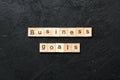 business GOAL word written on wood block. business GOAL text on cement table for your desing, concept Royalty Free Stock Photo