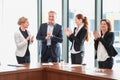 Business group clapping and smiling Royalty Free Stock Photo