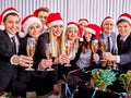 Business group people in santa hat drinking champagne at Xmas Royalty Free Stock Photo