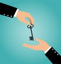 Business hand giving a house key to another hand